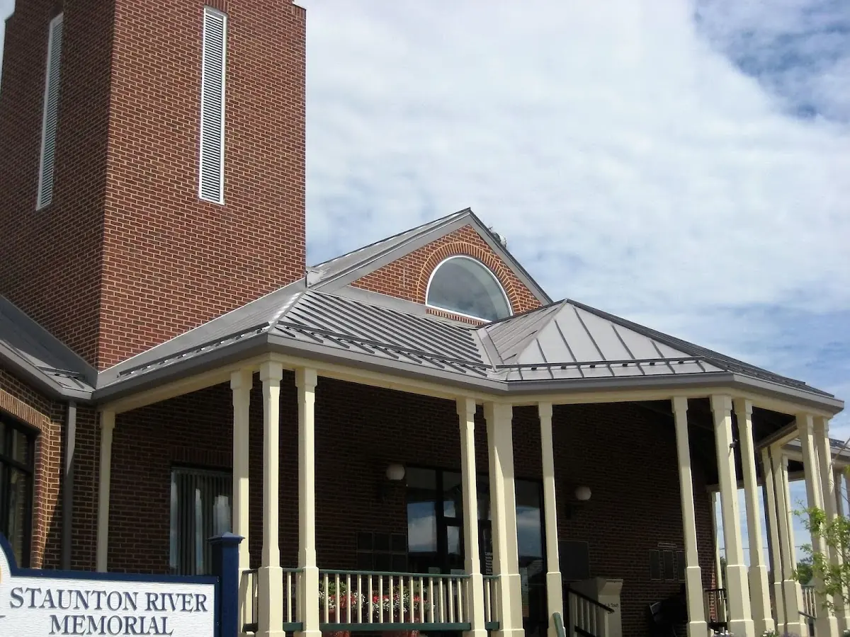 Skilled roofing craftsmen working on a residential roof in Downtown Historic District